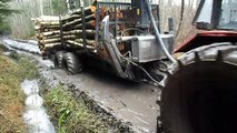 Belarus Mtz 1025 forestry tractor, muddy road