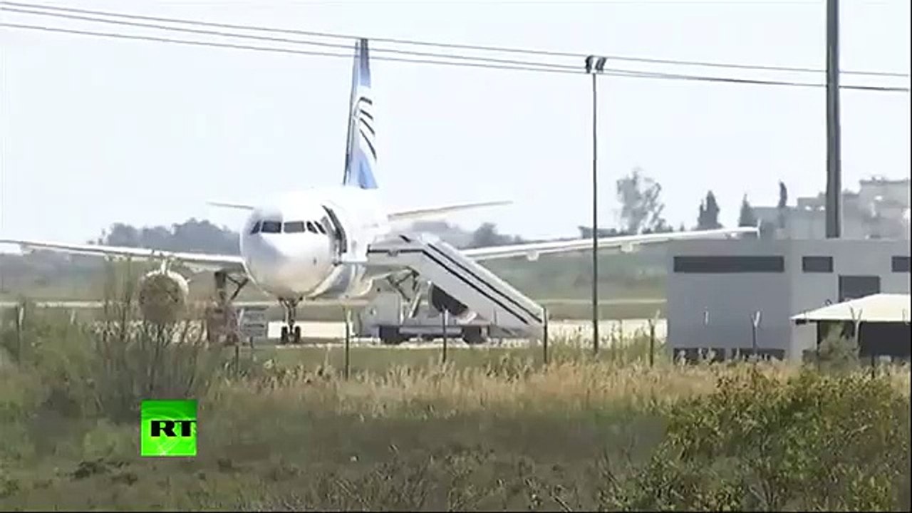Moment EgyptAir crew member escapes hijacked plane through cockpit window