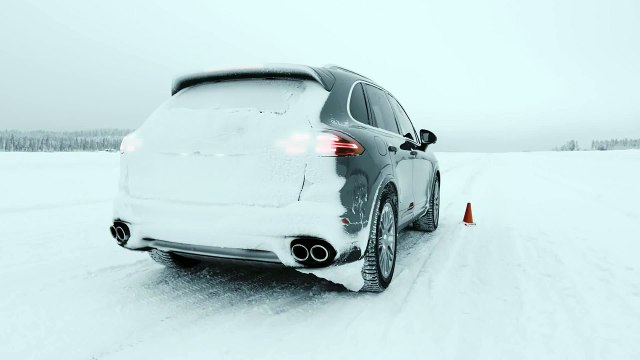 Porsche Cayenne Turbo S Accelerating on the Snow