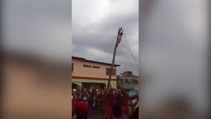 Crowd stunned as 'Jesus' falls 10 metres from cross during crucifixion show at Easter celebrations