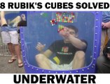 8 Rubiks Cubes Solved Underwater