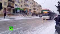 Ice tango: Crazy chaotic traffic drift in Azerbaijan as streets turn into skate rink