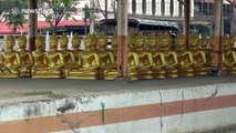 Dozens of stunning Buddha statues transported in Thailand