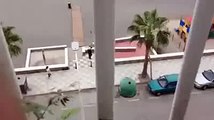 Spanish local police officer shooting to the air. Disparos al aire policia local españa