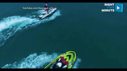 Man Riding Jet Ski Catches Drone Before it Sinks in the Sea