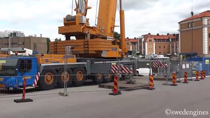 Liebherr LTM1500-8.1 lifting a section of the tower crane