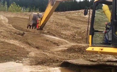 Badass Excavator Operator Rescues Baby Deer Hopelessly Stuck In Mud