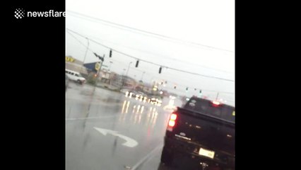 Traffic lights sway perilously during storm