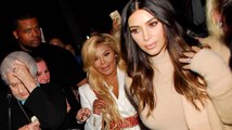 Paparazzi Falls into Kim Kardashian during Frenzy with Lil Kim