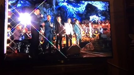 Collabro singing 'White Christmas' at Peak Cavern