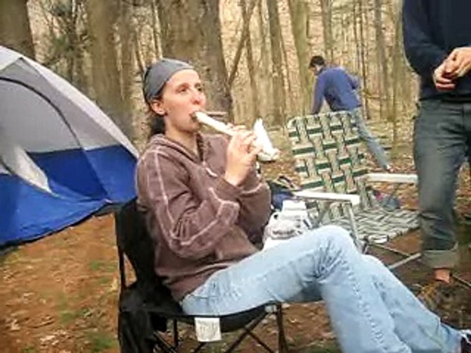 Playing the recorder while smoking 2 cigars!