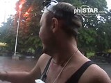 australian tourists swimming in floodwaters in the philippines