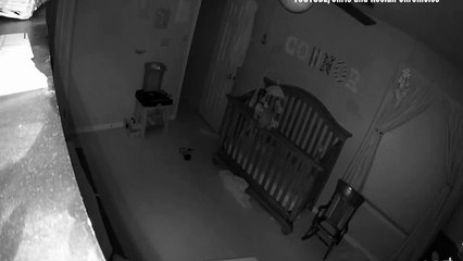 Spooky video shows 'possessed' crying baby balancing on rim of cot sparking special effects claims