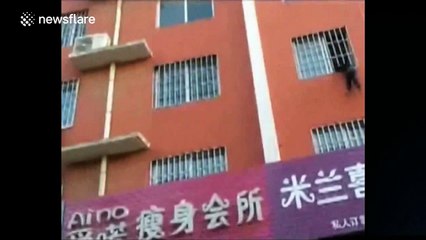 Man rescues a boy with head stuck in second-floor window