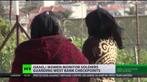 Israeli women monitor soldiers guarding West Bank checkpoints