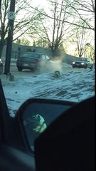 Car stuck on ice going up hill lol