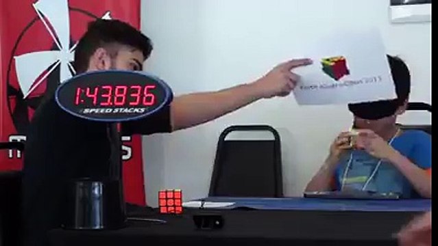 Kid solves Rubik's Cube in 30 seconds Blindfolded