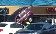 Crazy Guy In SUV Tries To Escape Tow Truck But Fails