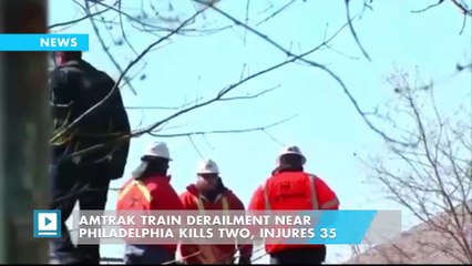 Amtrak train derailment near Philadelphia kills two, injures 35