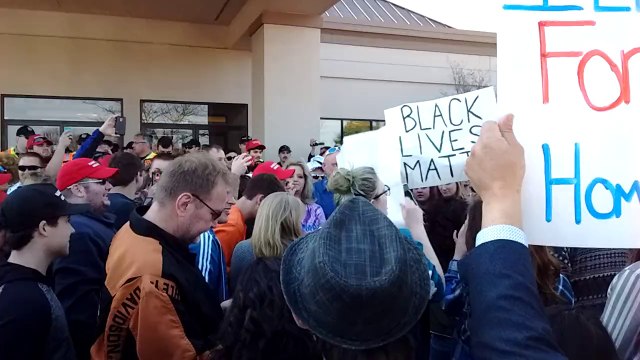 Anti-Trump Protester Punches a Supporter During a Wisconsin Rally