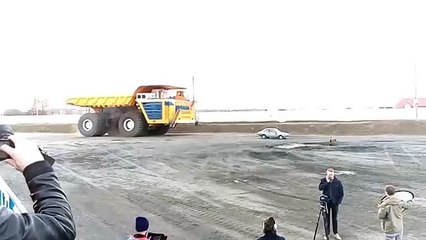 450-ton dump truck crushes passenger car