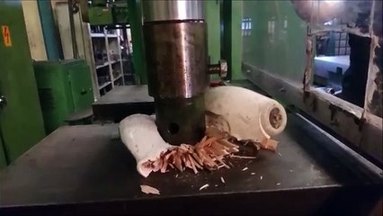 Crushing bowling ball and pin with hydraulic press