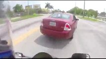 Road rage caught on camera driver tries ramming motorcylist