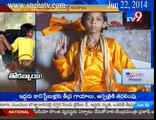 TV9 - Boy born with seven inch TAIL worshipped as a God
