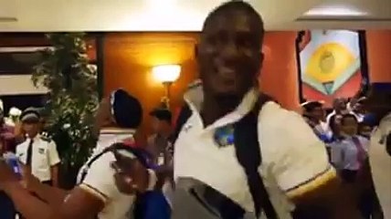 West Indies team celebrate win, with 'Champion' Dance