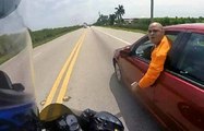 Absolutly Insane Driver Tries To Push Biker Off The Road