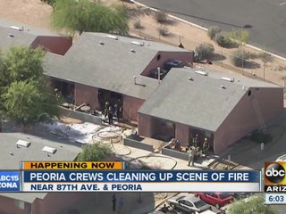 Peoria fire crews clean up scene of fire