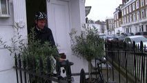 Jeremy Hunt cycles away from reporters as he leaves home