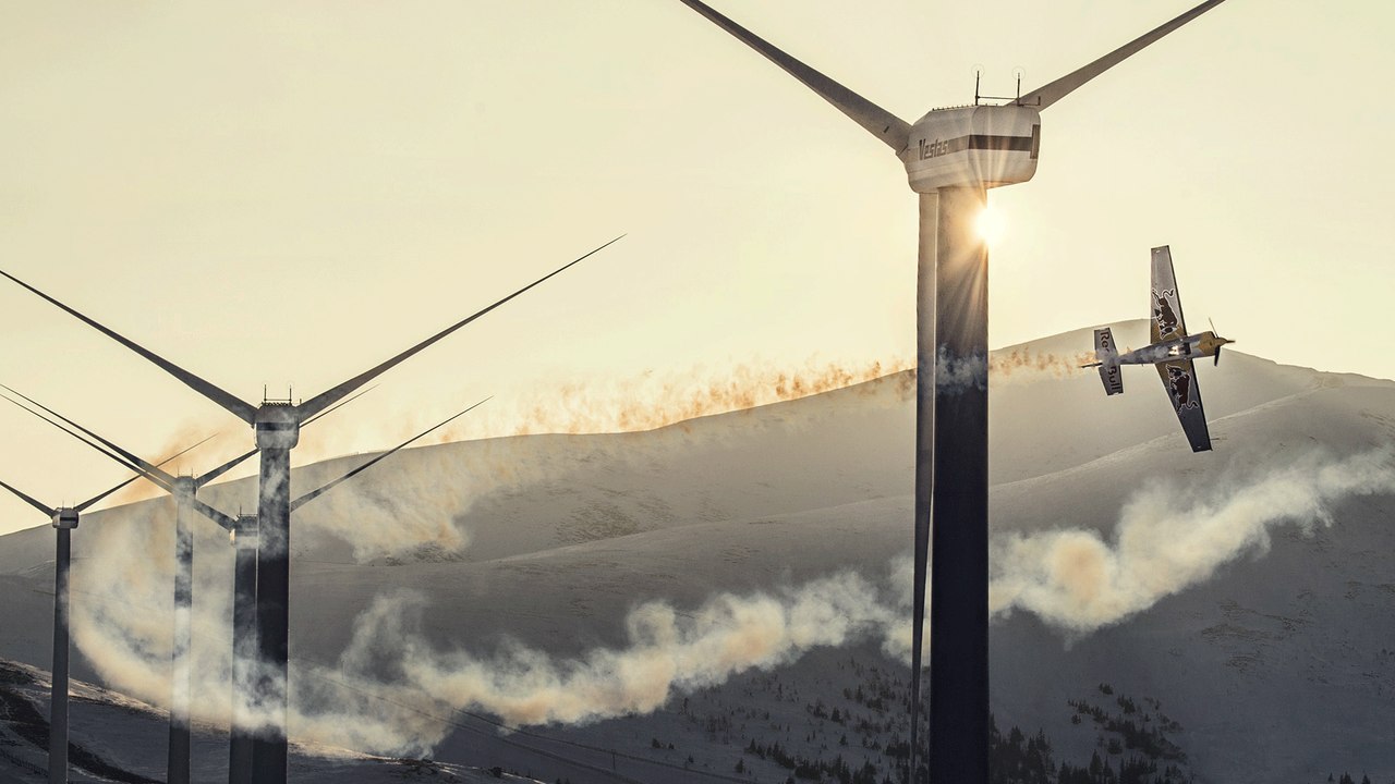 High Speed Slalom Flying Through a Wind Farm