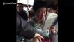 Chinese woman reads English loudly on bus, annoying other passengers