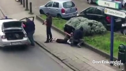 Tải video: Paris terror suspect Mohamed Abrini arrested in Anderlecht, Belgium.