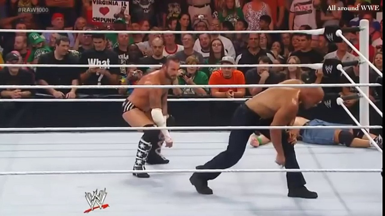 WWE CM Punk gives The Rock a GTS Slow Motion Replay from Raw 1000