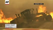 Raw: TV Crew Helps Man Escape OK Wildfire
