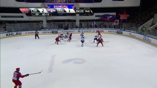 Igor Ozhiganov adds it to the net from blue line