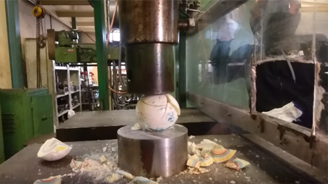 Microwaving A Jawbreaker And Then Crushing It With A Hydraulic Press