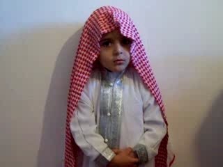 YOUNG  CHILD RECITING  CORAN