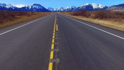 Road heads into beautiful mountains