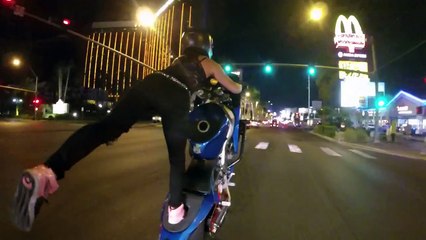 Crazy girl does motorcycle stunts-1