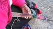 Weaving a belt with a backstrap loom near Cuzco