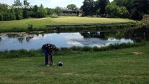 Angry golfer throws club and bag in pond