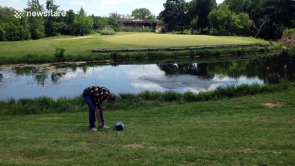 Angry golfer throws club and bag in pond