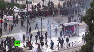 RAW: Teargas, petrol bombs during general strike in Athens