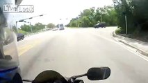 Crazy guy tries to RAM motorcycle multiple times