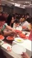 Chaos reigns as hungry Chinese tourists fight over jumbo shrimp in buffet restaurant in Thailand