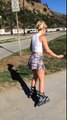 Girl On Rollerblades Faceplants Into Sand