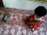 Cute Baby 8 months old enjoying digital education
